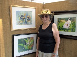 Sudbury Artist, Polly Meltzer with a few of her watercolor images from nature.